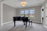 Nook off recreation room used as a music room but perfect for an office