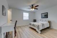 spacious bedroom with walk-in closet