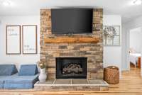 Stacked stone fireplace is a beautiful focal part of your living room.