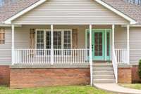 Large front porch to enjoy.