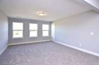 Spacious Bonus Room. Photo not of actual home.