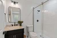 Master bath with tiled shower.