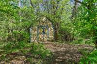 Storage shed located at back of property.