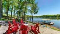 Lakeside firepit area complete with adirondack chairs! Grab the smores