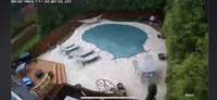 Aerial of pool with cover on in the winter.