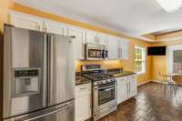 Kitchen also offers a gas stove, fridge remains with property