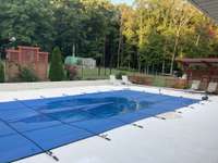 FRESHLY COATED POOL DECK