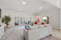 Open and Gracious Living Area Opening up to an Enormous Screened In Porch