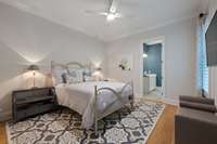 Main Floor Guest suite is located at the rear of the home and offers a gorgeous bath and walk in closet