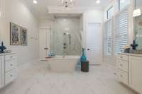 Primary bath is your own spa oais with double vanities, soaker tub, and huge walk in shower