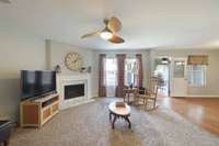 View of living area, dining area to the right.