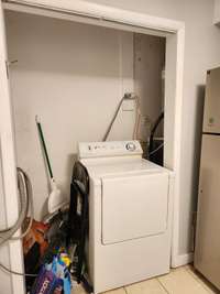 Washer Dryer hookups in nook off of the Kitchen
