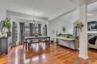 The bay window enhances the light in the dining room