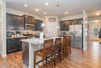 Stainless appliance and pantry in the kitchen