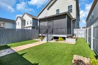 Fully fenced with artificial turf means you can actually enjoy your outdoor space without the maintenance hassles.