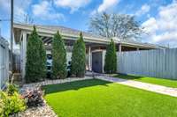 The garageport has 2 garage openers, a keypad, storage shed, motion lighting, and has been freshly painted.