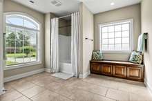 Bench area is plumbed for future tub, tubshower can easily be converted to tile shower