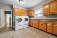 Oversized Laundry Room with Large walk in closet