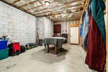 Basement level storage and tornado shelter