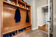 Large Mudroom Bench off garage with Exterior Pedestrian Door