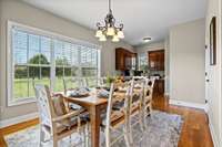 Large Dining area off Kitchen with Office Nook and Powder Room