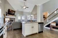 The spacious kitchen island makes cooking a delight.