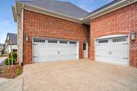 Ample parking with this 3-car garage with pedestrian door