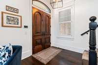 Exquisite architecture on beautiful front wood doors.