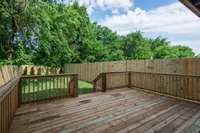 Large back deck has a gas line to keep the grills hooked up at all times. There is an extra 50' in the back of the lot for a larger yard than most HPRs provide.