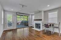 The garage door seals perfectly but also provides the opportunity to open up the living space to the back deck/yard.  If you love the house but not the door, the seller will consider framing it in and adding windows.