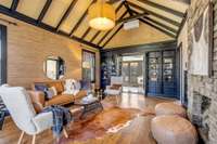 Living room connects to a beautiful sunroom