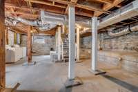 Enormous basement, with plenty of potential for all your creative ideas! Washer/dryer is here too