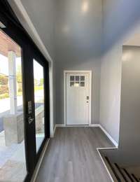 The entry to Unit B/ The front entrance is a coded key pad entrance as well for the security of the units.