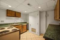 Lower level kitchen area in the finished basement.