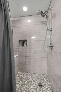 Tiled shower in primary bath