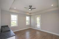 Bonus room upstairs with walk out covered porch. Wet bar also in this bonus room.