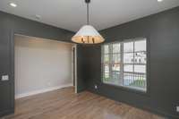 This front room looks out to the front porch and yard.