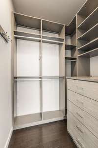 Expertly outfitted by California Closets to maximize dual hanging and storage space, the bedroom closet pulls out all the stops to accommodate your wardrobe, shoe collection, and much more.