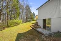 At back of home, there is a separate unfinished crawlspace room