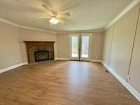 Wood burning fireplace in living area.