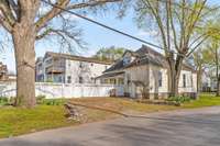 In addition to the garage, there is on-site parking in the side and front yards for four+ cars plus plenty of parking on adjacent streets. Access to the partially standing-height crawl space is from the back, where the tankless HWH is located.