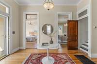 Entry hall with transoms above the doorways.