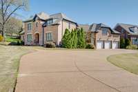 Beautifully landscaped brick home on half an acre