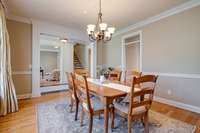 Formal dining room can easily fit an 8 person table