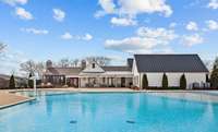 The amenity center boasts a gym and a pool