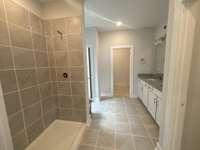 Primary bath has walk in shower