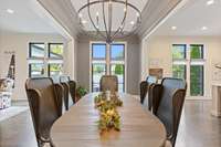 Dining room with large pella windows/doors allow for lots of natural light.