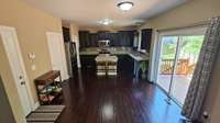 Full view of kitchen with breakfast area