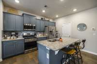 Taking a look at the kitchen you'll find lots of counter and cabinet space.