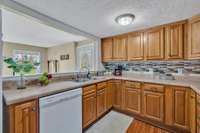 Kitchen is open to dining room/sunroom